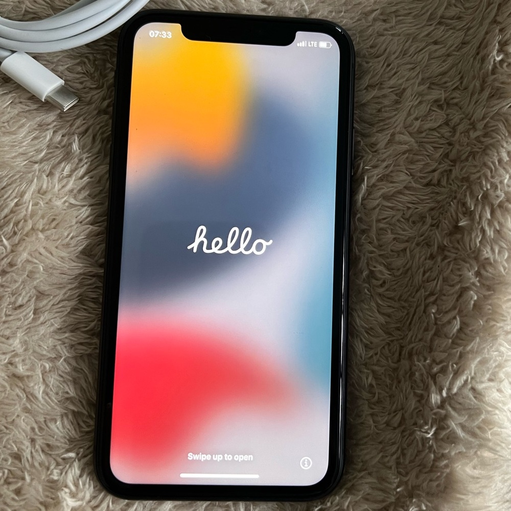 IPhone11 64gb mildly used, unlocked, no cracks or scratches .
